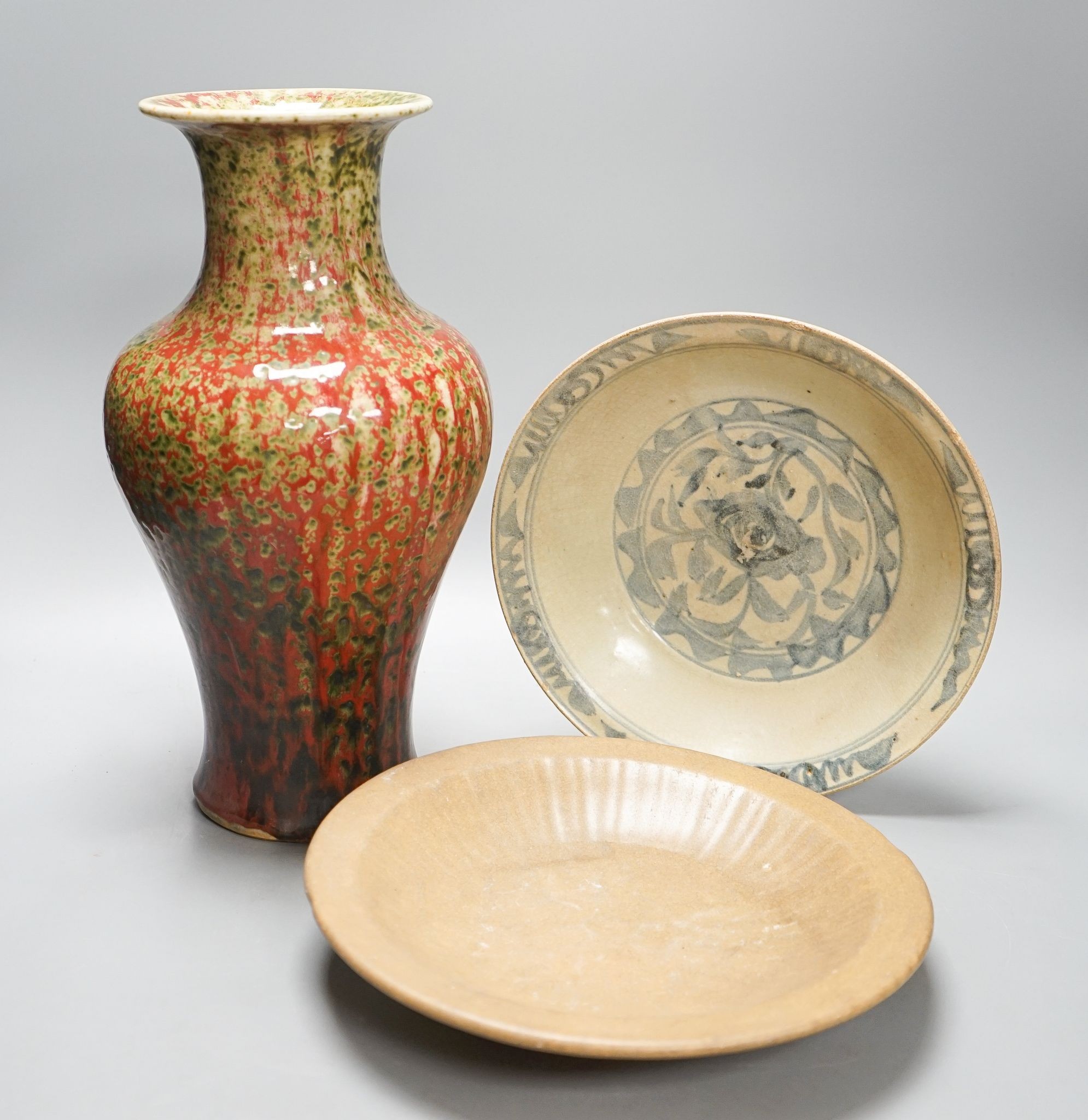 A Chinese flambe vase and two Ming dishes, vase 36cm